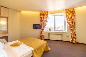 Postel nebo postele na pokoji v ubytování Mini-hotel People
