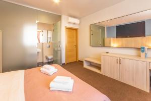 Postel nebo postele na pokoji v ubytování Mini-hotel People