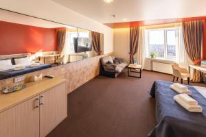 TV a/nebo společenská místnost v ubytování Mini-hotel People