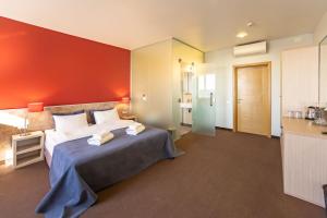 Postel nebo postele na pokoji v ubytování Mini-hotel People
