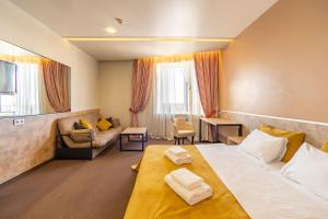 Postel nebo postele na pokoji v ubytování Mini-hotel People