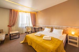 Postel nebo postele na pokoji v ubytování Mini-hotel People