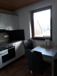 Kuchyň nebo kuchyňský kout v ubytování Appartement Roland