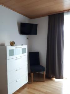 TV a/nebo společenská místnost v ubytování Appartement Roland