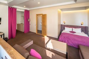 Postel nebo postele na pokoji v ubytování Mini-hotel People