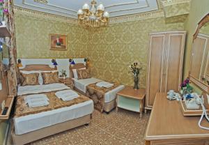 Postel nebo postele na pokoji v ubytování Glamour Classic Hotel Istanbul Sirkeci