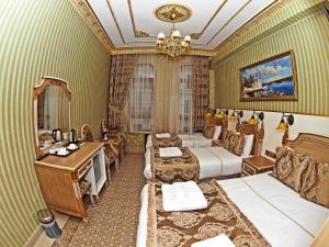 Postel nebo postele na pokoji v ubytování Glamour Classic Hotel Istanbul Sirkeci
