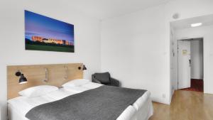 Letto o letti in una camera di Strand Hotell Borgholm