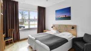 Letto o letti in una camera di Strand Hotell Borgholm