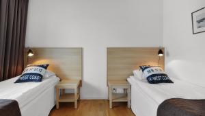 Letto o letti in una camera di Strand Hotell Borgholm