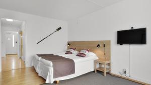Letto o letti in una camera di Strand Hotell Borgholm