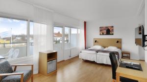 Letto o letti in una camera di Strand Hotell Borgholm