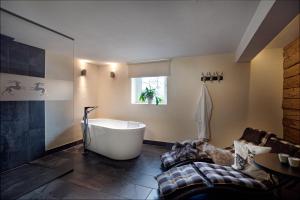 Łóżko lub łóżka w pokoju w obiekcie Chalet Jagdhof