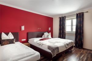 Łóżko lub łóżka w pokoju w obiekcie Chalet Jagdhof
