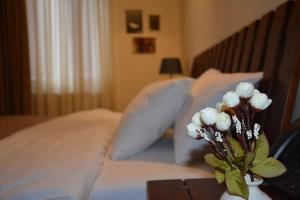 Letto o letti in una camera di Le Caucase