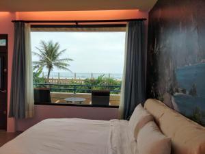 Postel nebo postele na pokoji v ubytování Ocean B&B
