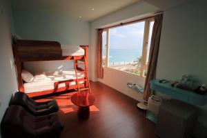 Postel nebo postele na pokoji v ubytování Ocean B&B