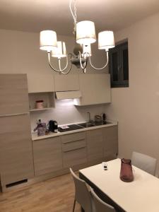 Kuchyň nebo kuchyňský kout v ubytování Residenza Vittorio Emanuele