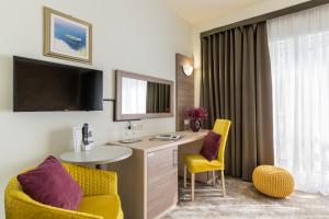 Μια τηλεόραση ή/και κέντρο ψυχαγωγίας στο Hotel Mondo
