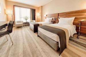 Posteľ alebo postele v izbe v ubytovaní Warsaw Plaza Hotel + 37 fotografií