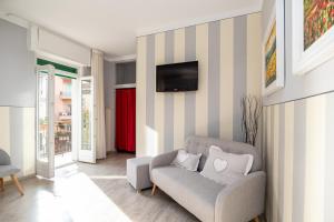 TV a/nebo společenská místnost v ubytování B&B Accademia