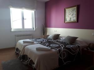 A bed or beds in a room at Ultreia