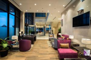 TV a/nebo společenská místnost v ubytování Normas Hotel
