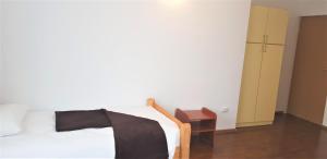 Postel nebo postele na pokoji v ubytování Coroian House