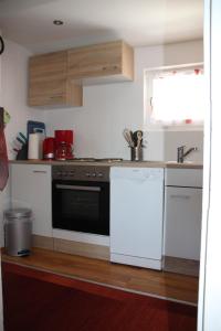 Kuchyň nebo kuchyňský kout v ubytování Haus Mauken - Appartments mit Panoramablick
