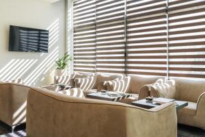 Χώρος καθιστικού στο Hotel Mondo
