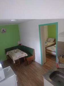 Postel nebo postele na pokoji v ubytování Fortuna Apartments
