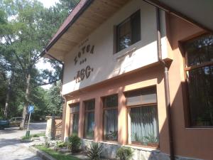 a building with windows on the side of it at Hotel Les in Razgrad