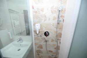 Koupelna v ubytování Hotel Delfin