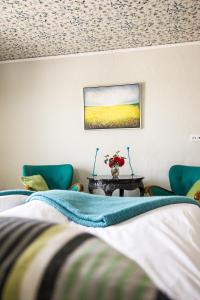 Postel nebo postele na pokoji v ubytování Cocoon Meetings
