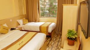 Una cama o camas en una habitación de Hotel Lapha