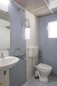 Koupelna v ubytování Hotel Pavitra