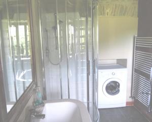 Ett badrum på Appartamenti Cenni - Relais su Lago
