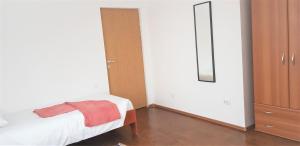 Postel nebo postele na pokoji v ubytování Coroian House