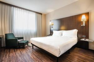 Posteľ alebo postele v izbe v ubytovaní Max Hotel Livorno