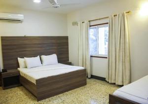 Ένα ή περισσότερα κρεβάτια σε δωμάτιο στο Motel Royal Fantasy