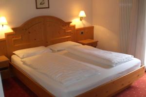 Postel nebo postele na pokoji v ubytování Hotel Salvan