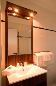 Koupelna v ubytování Hôtel Beau Rivage