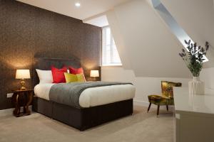 Кровать или кровати в номере Leeds Super Luxurious Apartments