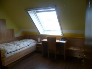 Cama ou camas em um quarto em Hotel Thünenhof