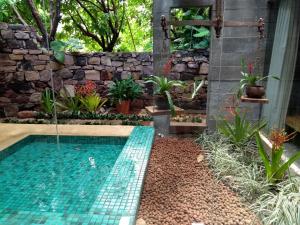 A piscina localizada em Hotel de Lençois ou nos arredores