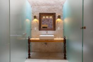 Um banheiro em Hotel de Lençois