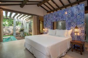 Cama ou camas em um quarto em Hotel de Lençois