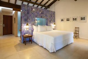 Cama ou camas em um quarto em Hotel de Lençois