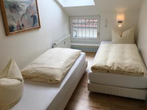 Un pat sau paturi într-o cameră la Villa Usedom App. 31 +20 fotografii