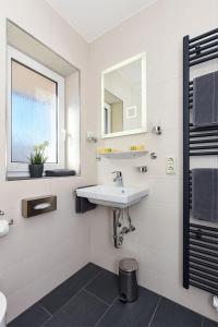 Koupelna v ubytování Hotel garni Haus am Meer